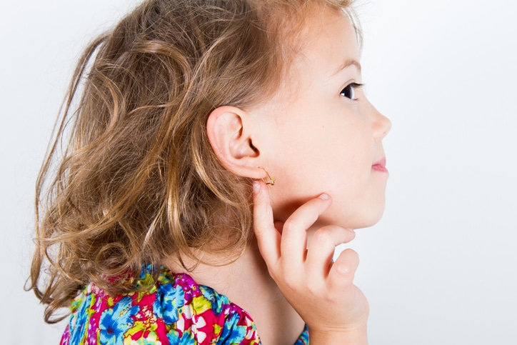 little girl with earring